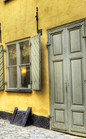 yellow exterior of old home in europe